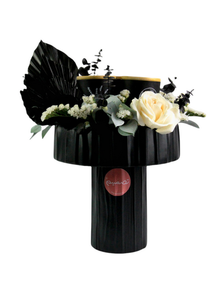 Gift in a black vase- هدية في مزهرية سوداء