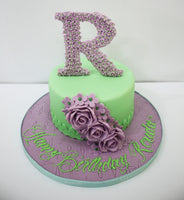 Round Cake with Flower & Letter On The Top